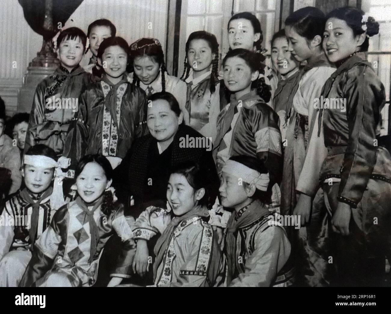 (180613) -- SHANGHAI, June 13, 2018 () -- File photo taken in Jan. 1960 shows Soong Ching Ling posing with kids at the Children s Palace under the China Welfare Institute (CWI) during the Chinese Spring Festival in Shanghai, east China. This year marks the 80th anniversary of the CWI, founded by Soong Ching Ling in 1938. The Shanghai-based organization focuses on maternal and child health, education and social welfare. Soong Ching Ling, born in Shanghai in 1893, was the wife of Chinese revolutionary Dr. Sun Yat-sen, who led the 1911 Revolution. (/CWI) (wyl) CHINA-SHANGHAI-CWI-SOONG CHING LING- Stock Photo