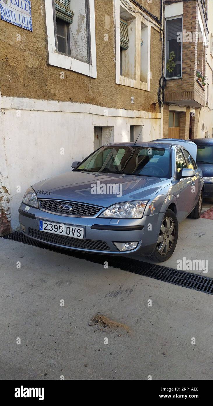 A typical blue sedan parked in a town, a third-generation Ford Mondeo Stock Photo