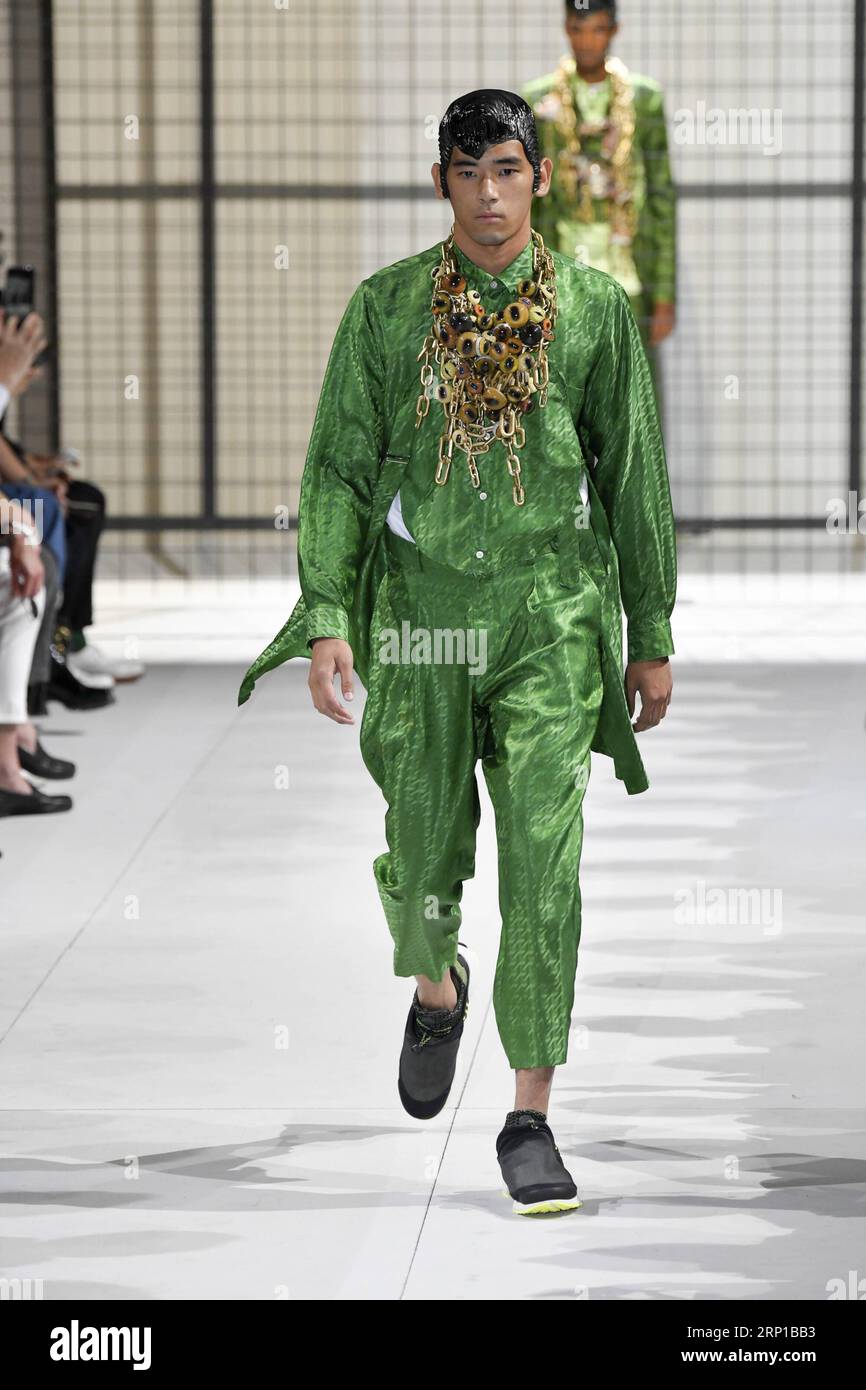 180622 PARIS June 22 2018 Models present creations of Comme des Garcons during men s fashion week for 2019 Spring Summer Collection in Paris France on June 22 2018. FRANCE PARIS MEN