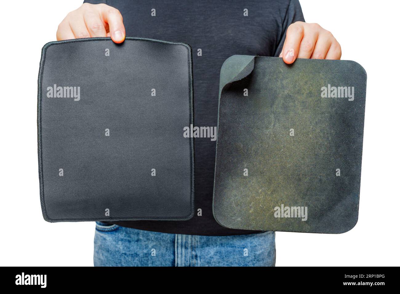 Person demonstrates a brand new clean mouse pad close to a wellused
