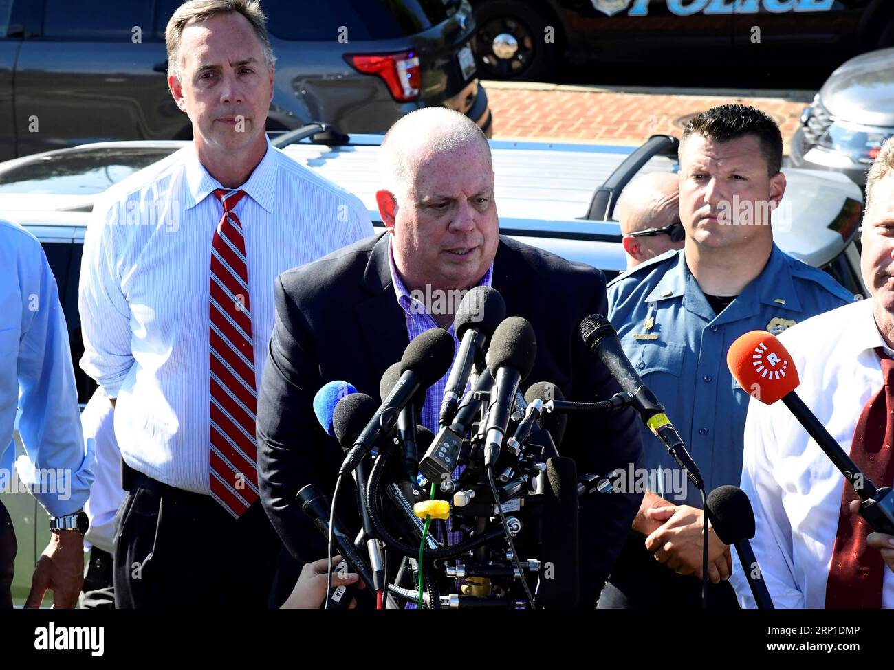 (180628) -- ANNAPOLIS (U.S.), June 28, 2018 -- Maryland Governor Larry Hogan (C) speaks to the media near the scene of a mass shooting in Annapolis, the capital city of eastern U.S. state Maryland, on June 28, 2018. Five people were killed on Thursday afternoon with several gravely injured in a mass shooting at local daily newspaper Capital Gazette in Annapolis, police said. ) U.S.-ANNAPOLIS-NEWSPAPER-SHOOTING YangxChenglin PUBLICATIONxNOTxINxCHN Stock Photo