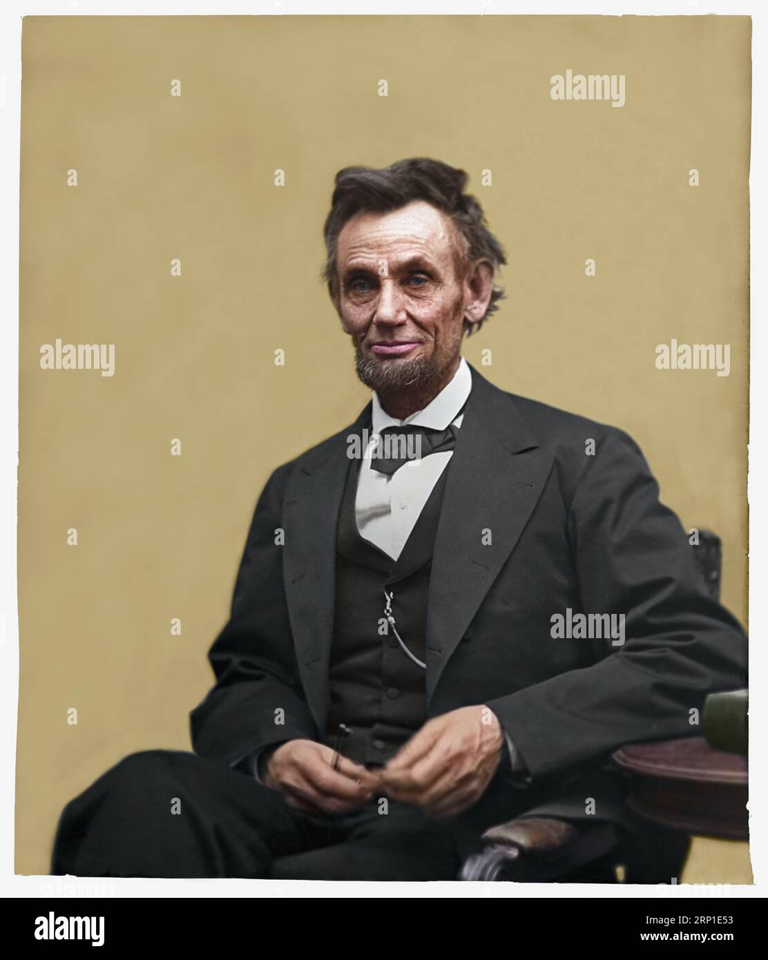 Abraham Lincoln, three-quarter length portrait, seated and holding his spectacles and a pencil. The photograph was created by Alexander Gardner on 5th Stock Photo