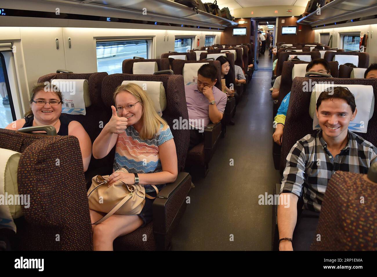 (180701) -- TIANJIN, July 1, 2018 -- Passengers take the G7 new longer ...