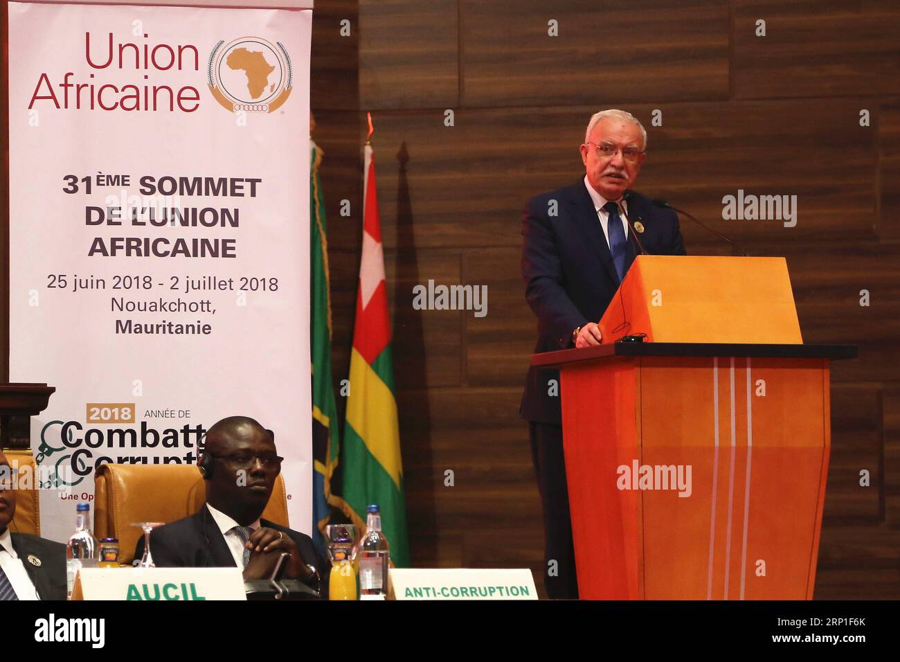 (180702) -- NOUAKCHOTT, July 2, 2018 -- Palestinian Minister of Foreign Affairs Riyad al-Maliki delivers a speech at the 31st Summit of the African Union (AU) in Nouakchott, the capital of Mauritania, on July 1, 2018. African leaders met here for the 31st AU summit on Sunday, focusing on anti-corruption as well as trade, peace and security. ) (ly) MAURITANIA-NOUAKCHOTT-AFRICAN UNION-SUMMIT ZhangxXuefei PUBLICATIONxNOTxINxCHN Stock Photo