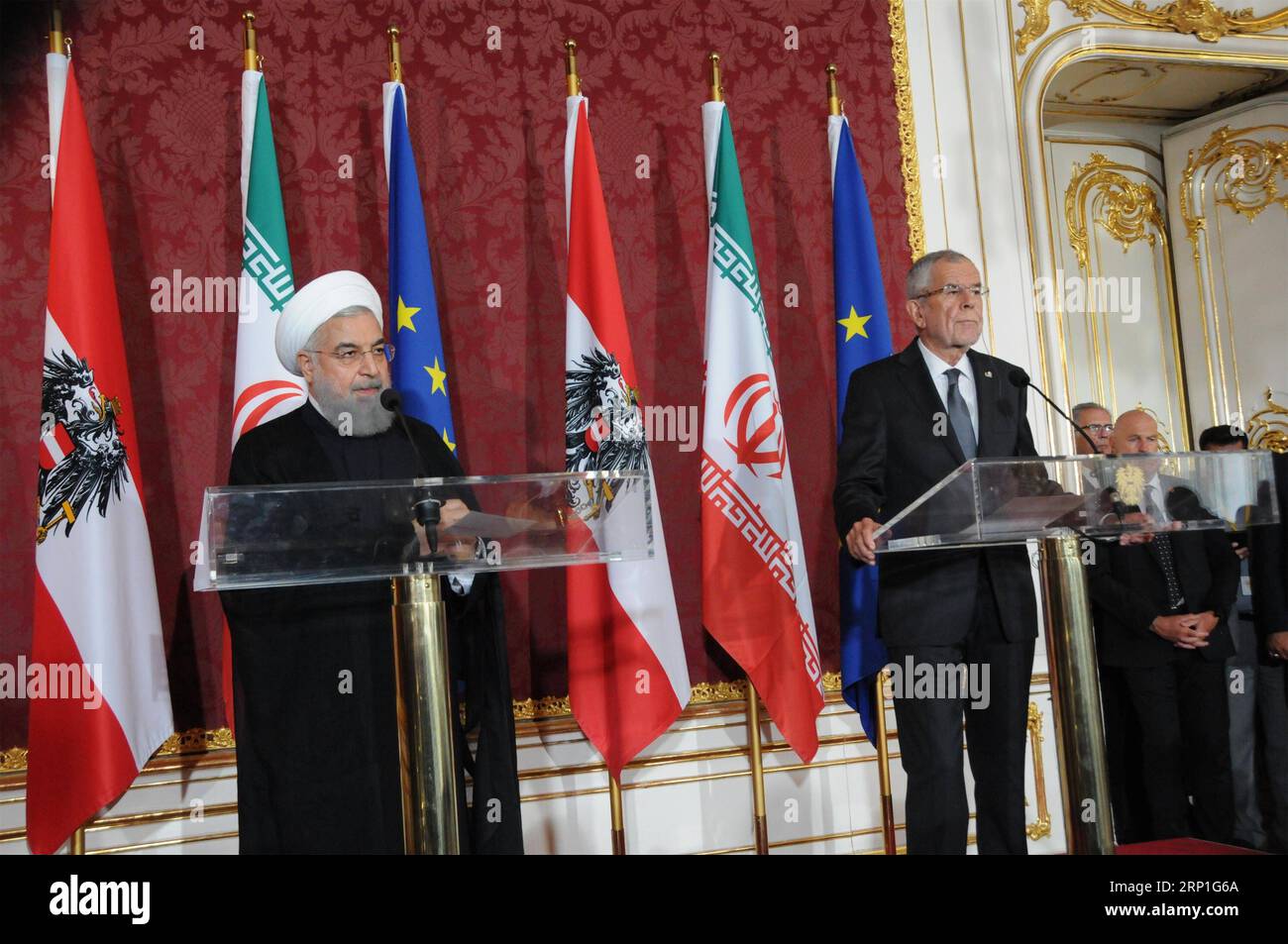 (180704) -- VIENNA, July 4, 2018 -- Iranian President Hassan Rouhani (L) and his Austrian counterpart Alexander Van der Bellen attend a press conference in Vienna, Austria, July 4, 2018. Hassan Rouhani Wednesday reassured his country s intention on sticking to the Iranian nuclear deal despite a recent withdrawal by the United States. ) AUSTRIA-VIENNA-IRAN-PRESIDENT-NUCLEAR DEAL LiuxXiang PUBLICATIONxNOTxINxCHN Stock Photo