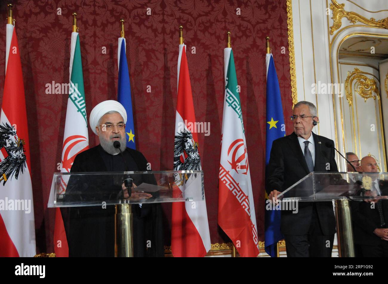 (180704) -- VIENNA, July 4, 2018 -- Iranian President Hassan Rouhani (L) and his Austrian counterpart Alexander Van der Bellen attend a press conference in Vienna, Austria, July 4, 2018. Hassan Rouhani Wednesday reassured his country s intention on sticking to the Iranian nuclear deal despite a recent withdrawal by the United States. ) AUSTRIA-VIENNA-IRAN-PRESIDENT-NUCLEAR DEAL LiuxXiang PUBLICATIONxNOTxINxCHN Stock Photo