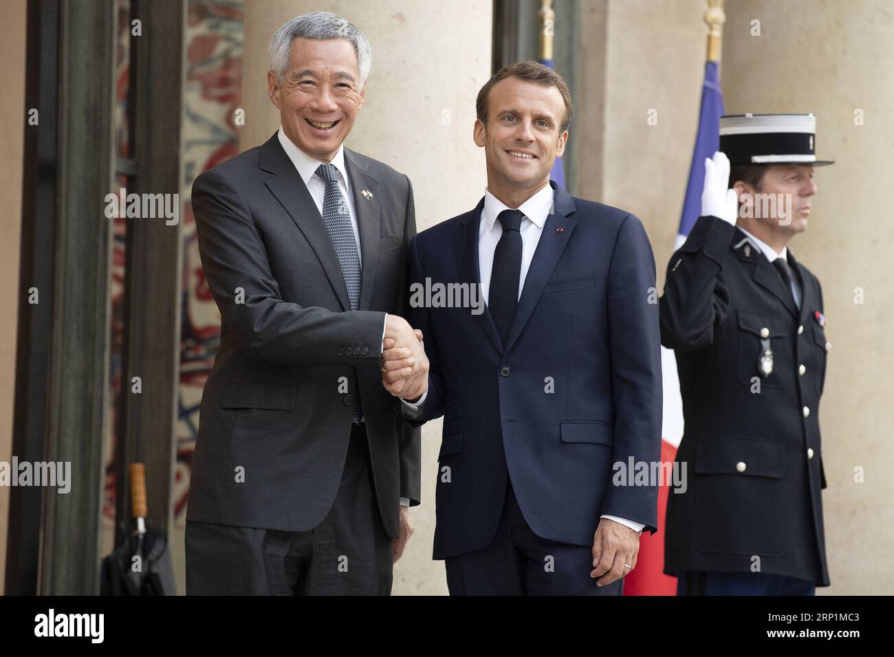 (180714) PARIS, July 14, 2018 French President Emmanuel Macron (C