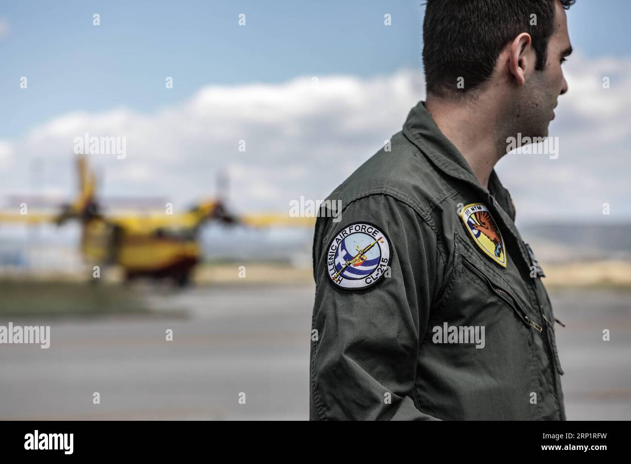 (180721) -- ATHENS, July 21, 2018 -- Photo taken on July 20, 2018 shows a pilot in front of a firefighting aircraft of 355 Tactical Transport Squadron at Elefsina Air Base, Athens, Greece. The 355 Tactical Transport Squadron was established in 1947 to fight wildfires. ) (zcc) GREECE-ATHENS-FIREFIGHTING SQUADRON LefterisxPartsalis PUBLICATIONxNOTxINxCHN Stock Photo