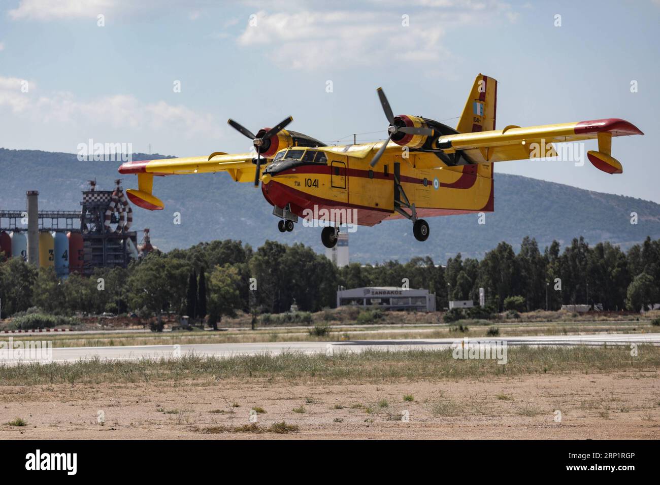 (180721) -- ATHENS, July 21, 2018 -- Photo taken on July 20, 2018 shows a firefighting aircraft of 355 Tactical Transport Squadron at the Elefsina Air Base, Athens, Greece. The 355 Tactical Transport Squadron was established in 1947 to fight wildfires. ) (zcc) GREECE-ATHENS-FIREFIGHTING SQUADRON LefterisxPartsalis PUBLICATIONxNOTxINxCHN Stock Photo