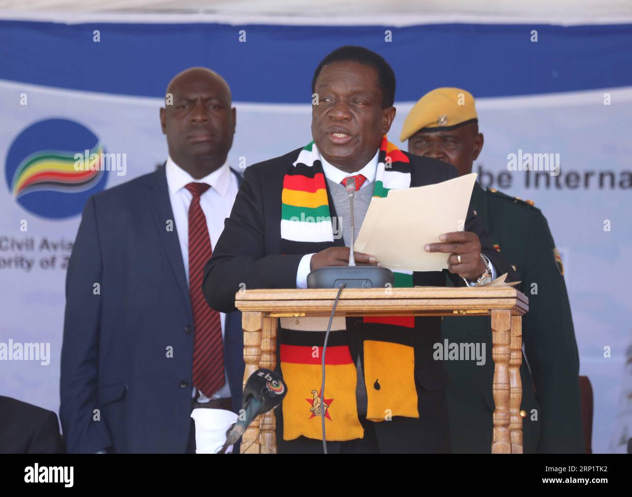 (180723) -- HARARE, July 23, 2018 -- Zimbabwean President Emmerson Mnangagwa (Front) addresses a groundbreaking ceremony of the upgrading and expansion project of the Robert Gabriel Mugabe International Airport in Harare, Zimbabwe, on July 23, 2018. Zimbabwe s main airport is set to undergo a major facelift to be funded by China as part of the government s efforts to transform the facility into a regional aviation hub. ) ZIMBABWE-HARARE-AIRPORT-UPGRADING AND EXPANSION WORK ShaunxJusa PUBLICATIONxNOTxINxCHN Stock Photo