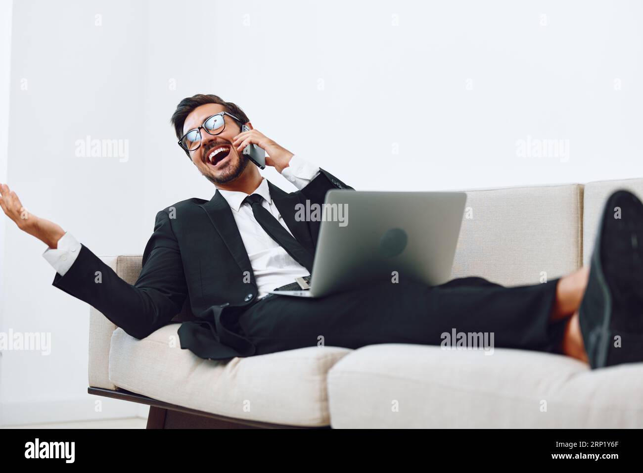 Conversation man winner call computer smile video office talk laptop ...