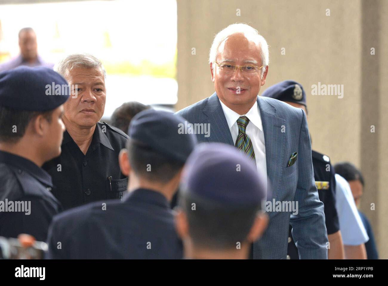 (180808) -- KUALA LUMPUR, Aug. 8, 2018 -- Former Malaysian Prime Minister Najib Razak appears at the Kuala Lumpur Courts complex in Kuala Lumpur in Malaysia, Aug. 8, 2018. Former Malaysian Prime Minister Najib Razak on Wednesday was charged with three offenses related to money-laundering and anti-terrorism financing, in addition to several counts of criminal breach of trust and corruption charges that were served in early July. ) (lrz) MALAYSIA-KUALA LUMPUR-NAJIB-CHARGES ChongxVoonxChung PUBLICATIONxNOTxINxCHN Stock Photo
