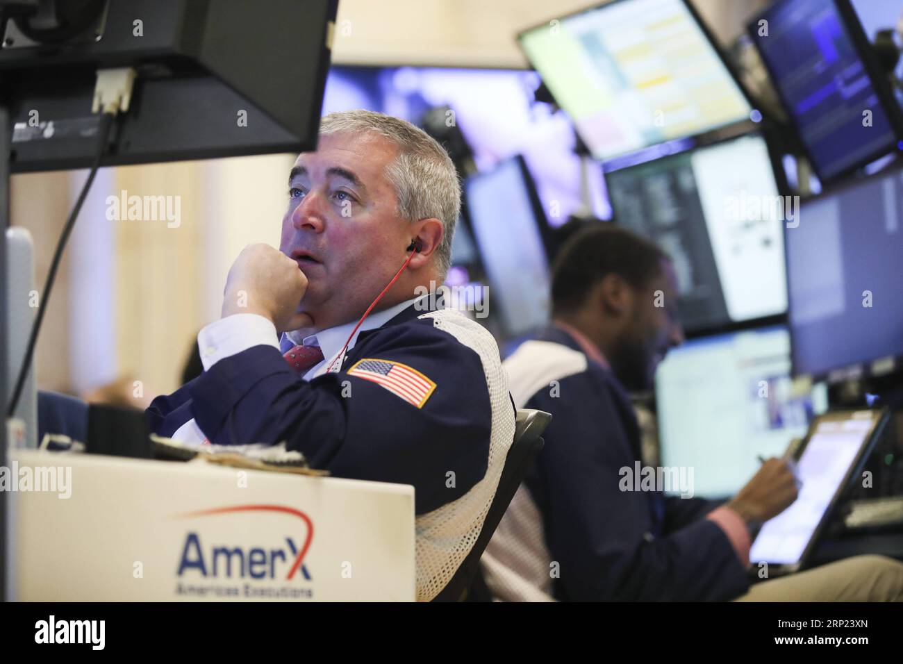 (180815) -- NEW YORK, Aug. 15, 2018 -- Traders work at the New York Stock Exchange in New York, the United States, on Aug. 15, 2018. U.S. stocks closed lower on Wednesday. The Dow Jones Industrial Average fell 137.51 points, or 0.54 percent, to 25,162.41. The S&P 500 was down 21.59 points, or 0.76 percent, to 2,818.37. The Nasdaq Composite Index dropped 96.78 points, or 1.23 percent, to 7,774.12. ) U.S.-NEW YORK-STOCKS WangxYing PUBLICATIONxNOTxINxCHN Stock Photo