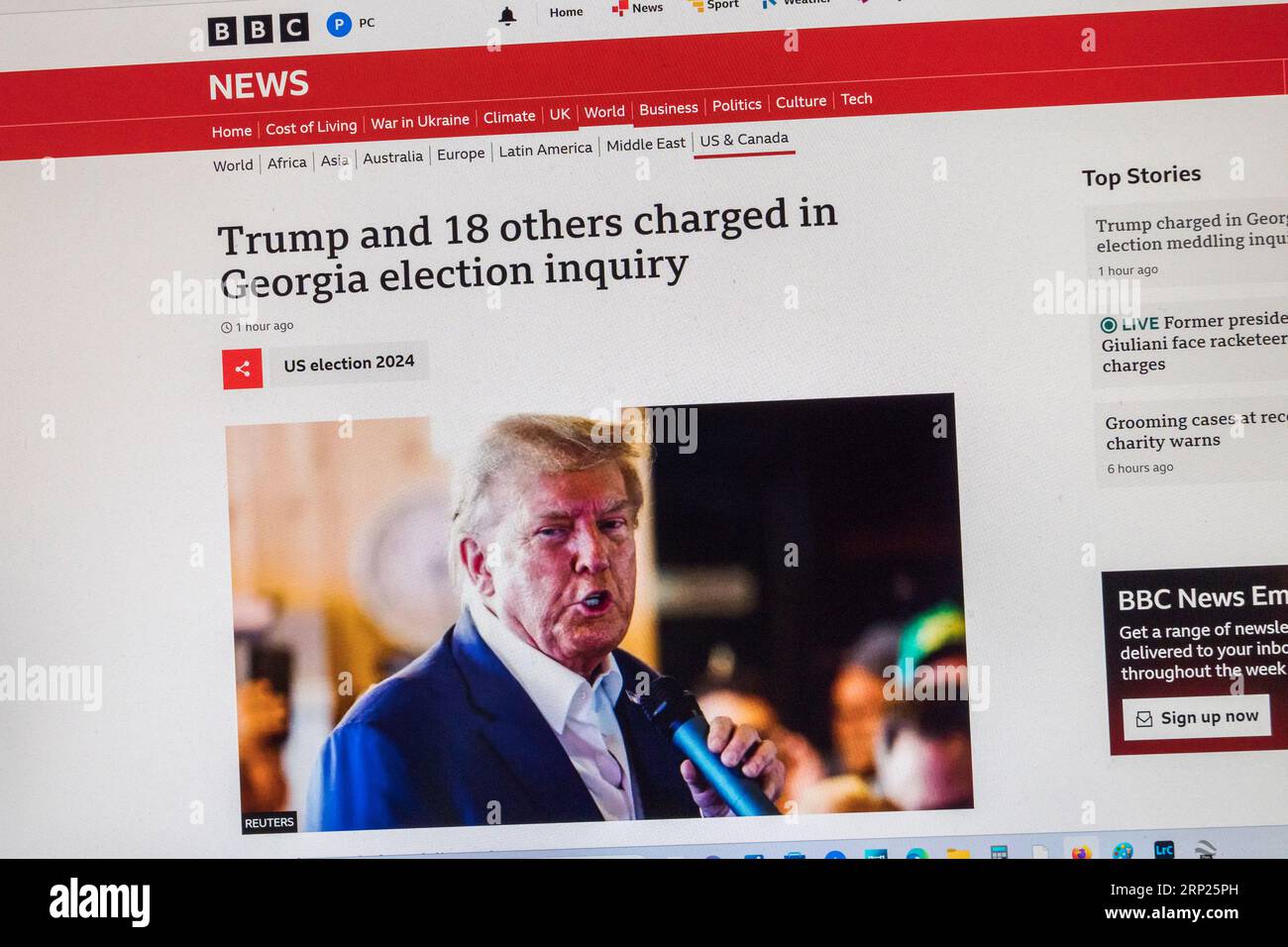'Trump and 18 others charged in Georgia election inquiry' headline on BBC News  website with breaking news, 15th August 2023. Stock Photo