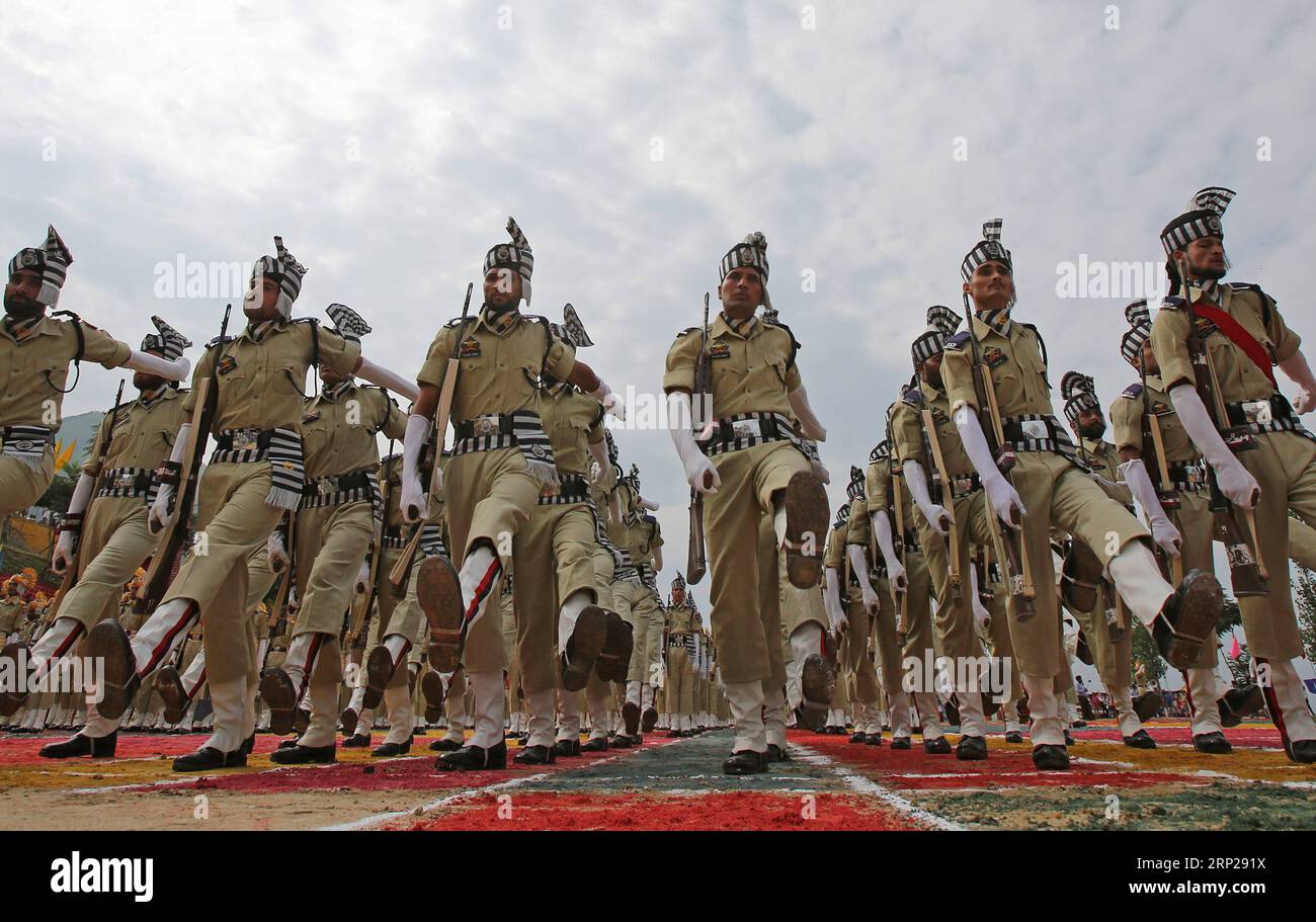(180825) -- SRINAGAR, Aug. 25, 2018 -- Recruits of Indian police march during a passing out parade at a training center in Lethpora, about 20 km south of Srinagar, summer capital of Indian-controlled Kashmir, Aug. 25, 2018. A group of recruits were formally inducted into the Indian police after completing several months of training in physical fitness, weapon handling, commando operations and counter insurgency, a police spokesman said.) (zxj) INDIAN-CONTROLLED KASHMIR-POLICE PASSING OUT PARADE JavedxDar PUBLICATIONxNOTxINxCHN Stock Photo