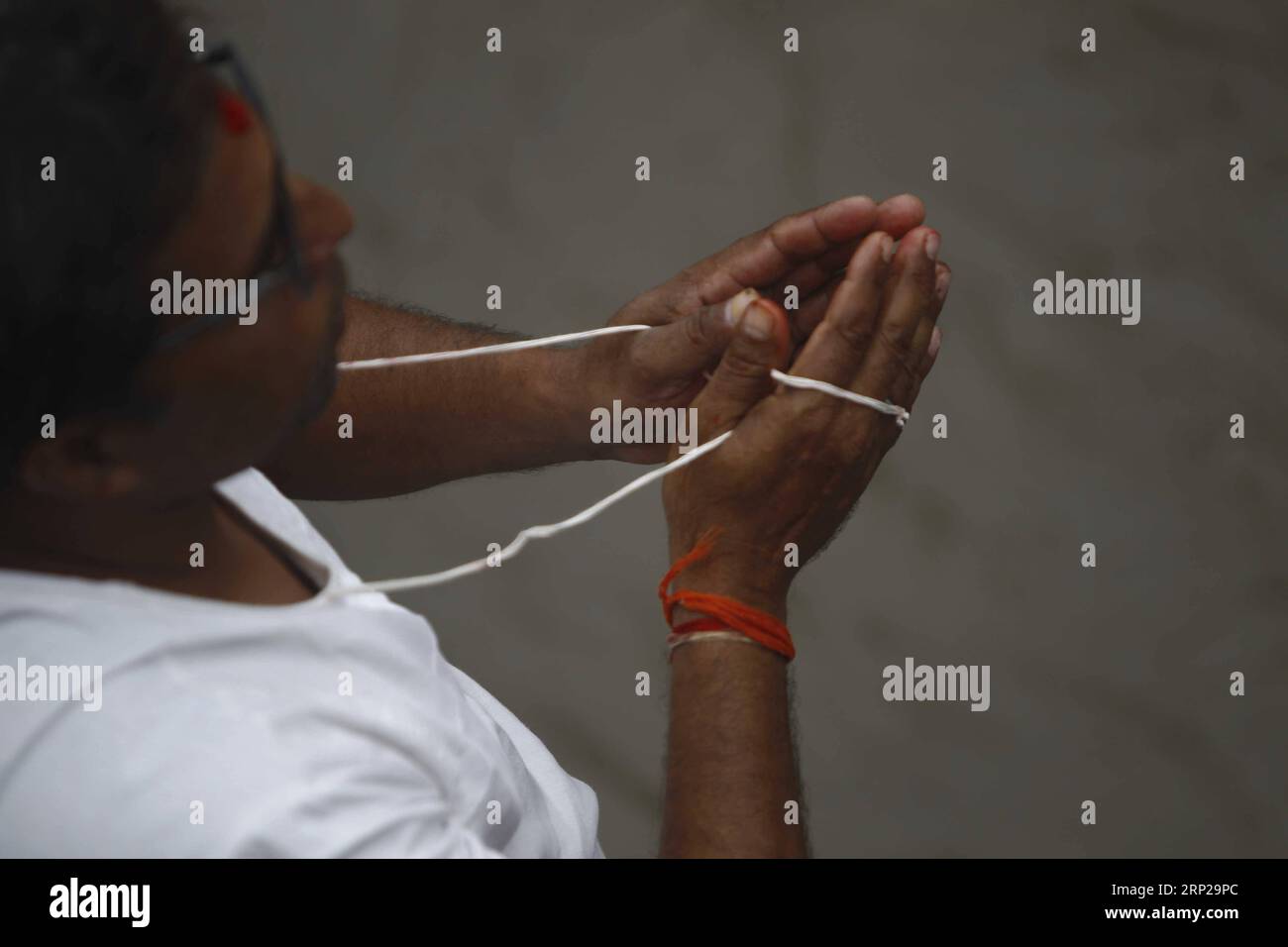 Sacred thread hi-res stock photography and images - Alamy