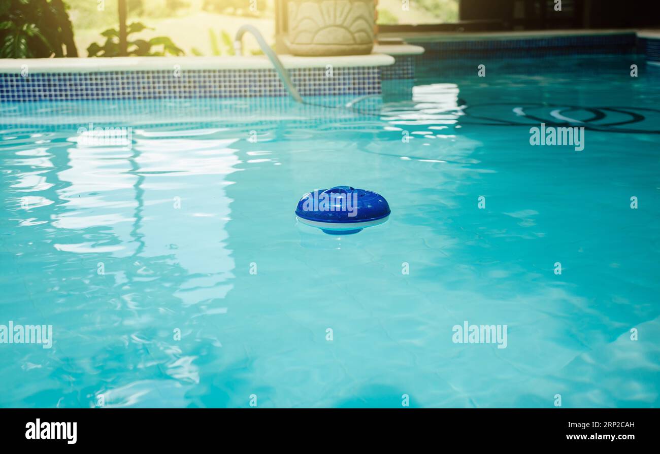 A chlorine float in a swimming pool. Dosing float for swimming pool