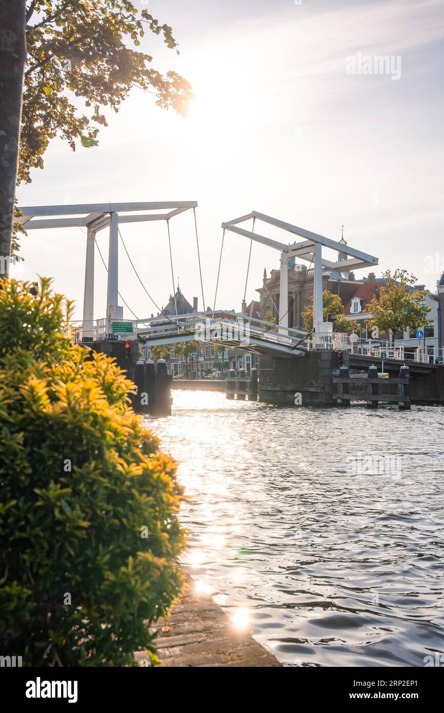 Historic drawbridge Gravestenenbrug at sunset, Haarlem, Netherlands ...