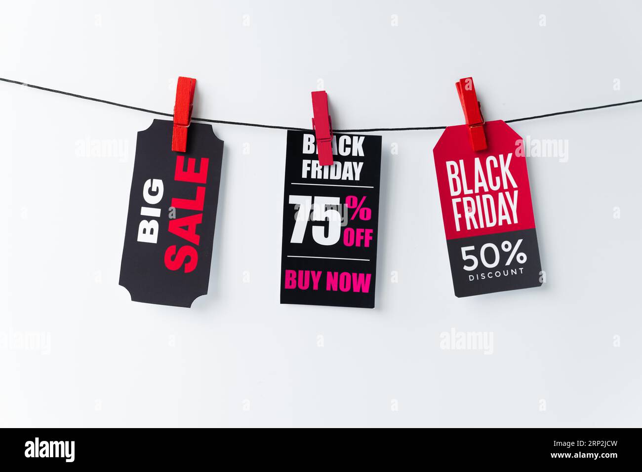 Collection hanging tags plain background Stock Photo - Alamy