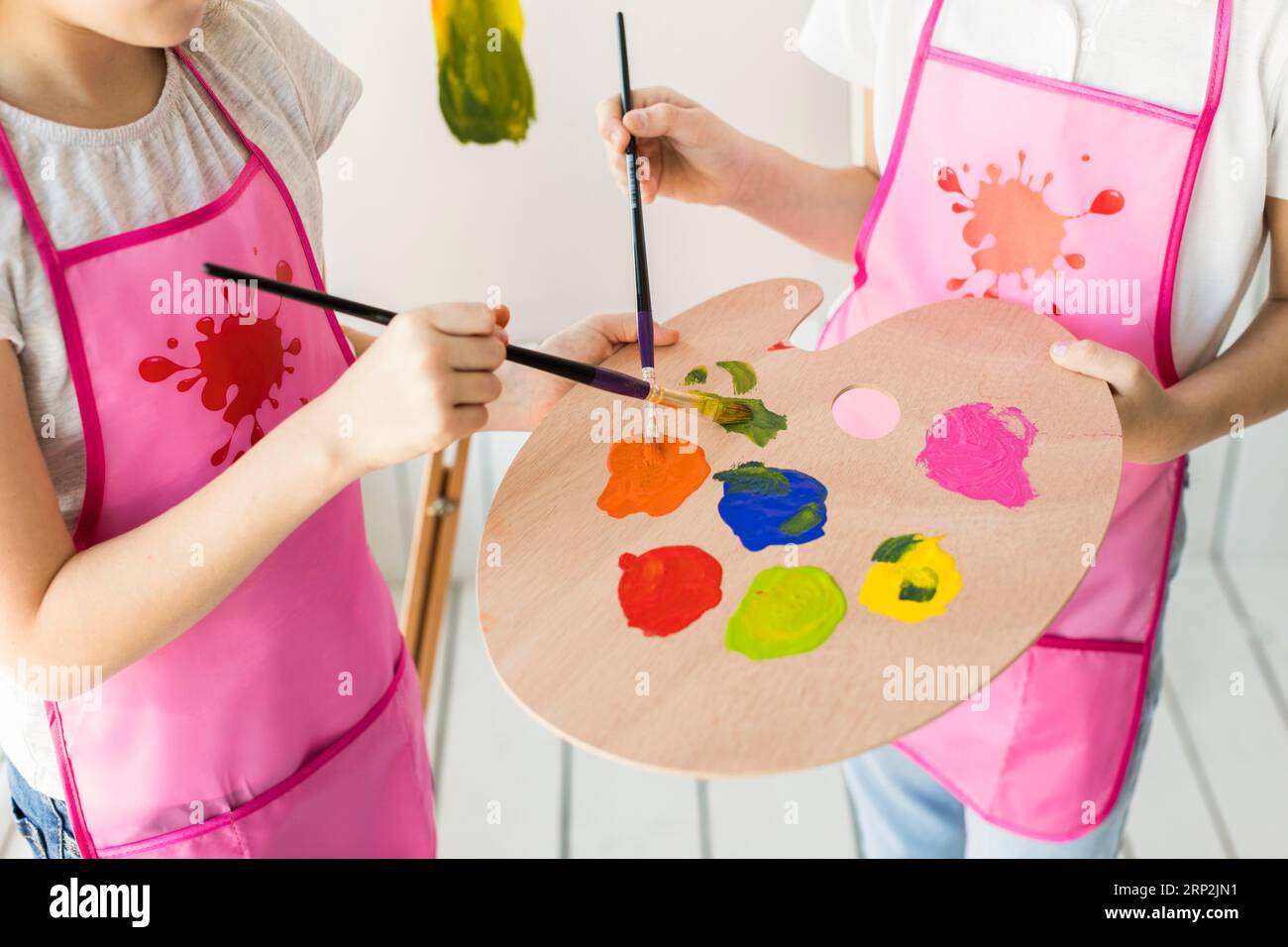 Paint brush with wooden handle and dab of pink paint Stock Illustration by  ©vanazi #27605605