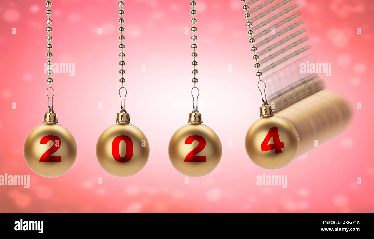 The year 2024 is coming.  The numbers of 2024 are written on the New Year's golden balls. New year and christmas concept Stock Photo