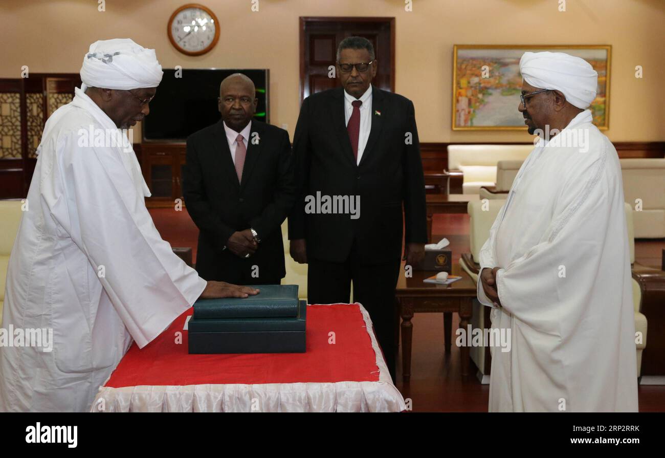 (180910) -- KHARTOUM, Sept. 10, 2018 -- Osman Mohamed Yousif Kibir (1st L) is sworn in as Second Vice President of Sudan in Khartoum, Sudan, on Sept. 10, 2018. Sudan s newly-appointed First Vice President Bakri Hassan Saleh, Second Vice President Osman Mohamed Yousif Kibir and Prime Minister Mutaz Mussa were sworn in on Monday before Sudanese President Omar al-Bashir. ) SUDAN-KHARTOUM-GOVERNMENT LEADERS-SWEARING-IN CEREMONY MohamedxKhidir PUBLICATIONxNOTxINxCHN Stock Photo