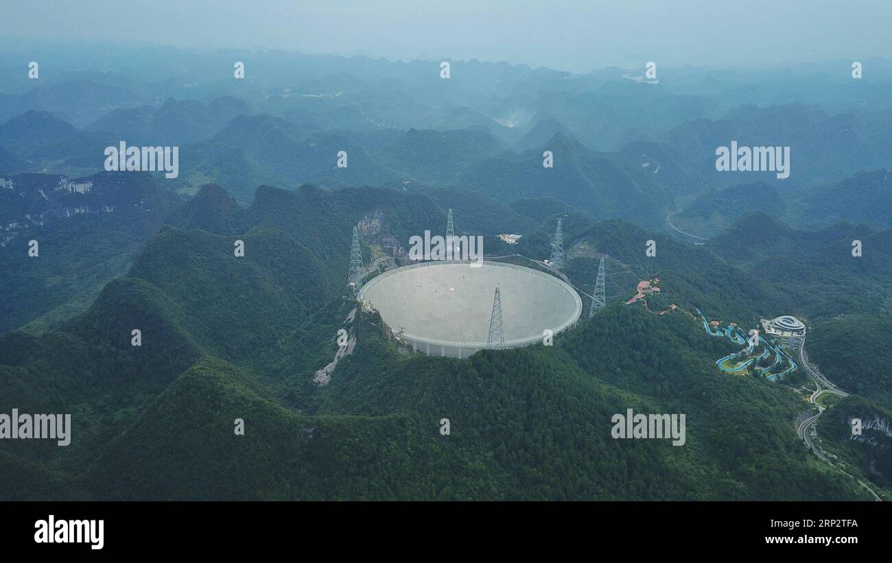 (180911) -- PINGTANG, Sept. 11, 2018 -- Photo taken on Sept. 10, 2018 shows China s Five-hundred-meter Aperture Spherical Radio Telescope (FAST) in southwest China s Guizhou Province. FAST has discovered 44 new pulsars so far. )(mcg) CHINA-GUIZHOU-FAST TELESCOPE-PULSARS (CN) OuxDongqu PUBLICATIONxNOTxINxCHN Stock Photo