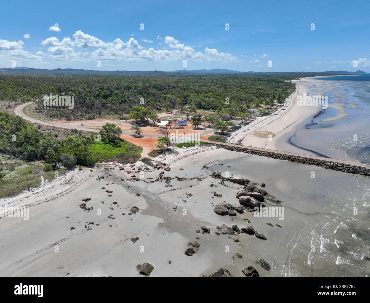 Aerial view of white rippling sandy beach and blue clear water in Lockhart River Stock Photo