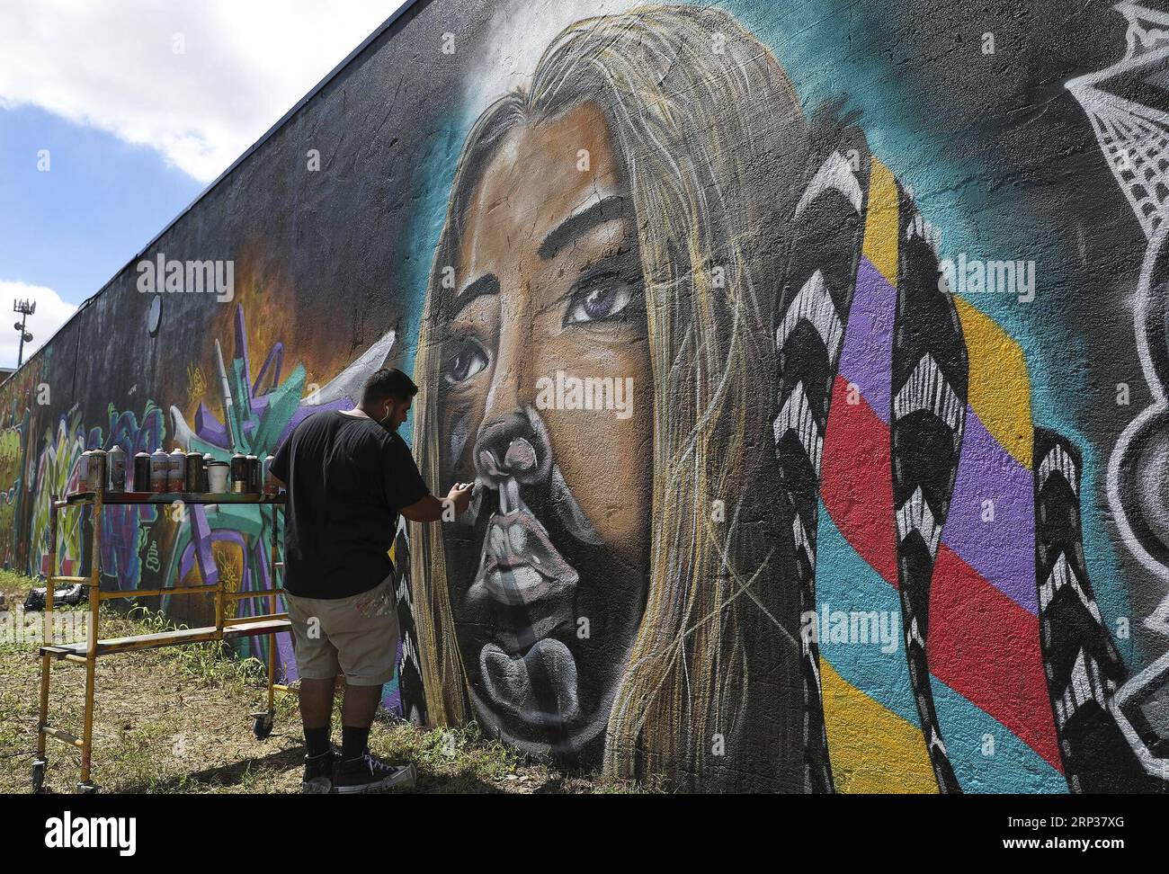 (180924) -- HOUSTON, Sept. 24, 2018 -- Guatemala-born artist Jalel Lopez paints his Guatemala-inspired mural in Greater Northside Houston area, the United States on Sept. 23, 2018. Over a hundred world artists gathered in Houston, the fourth largest city of the United States, from Friday to Sunday, presenting all kinds of street art paintings on the walls of various buildings. Coming back for the sixth year in a row, the street art festival, Meeting of Styles, is bringing world-class artists to the Greater Northside Houston area. ) (zxj) U.S.-HOUSTON-MEETING OF STYLES Yi-ChinxLee PUBLICATIONxN Stock Photo