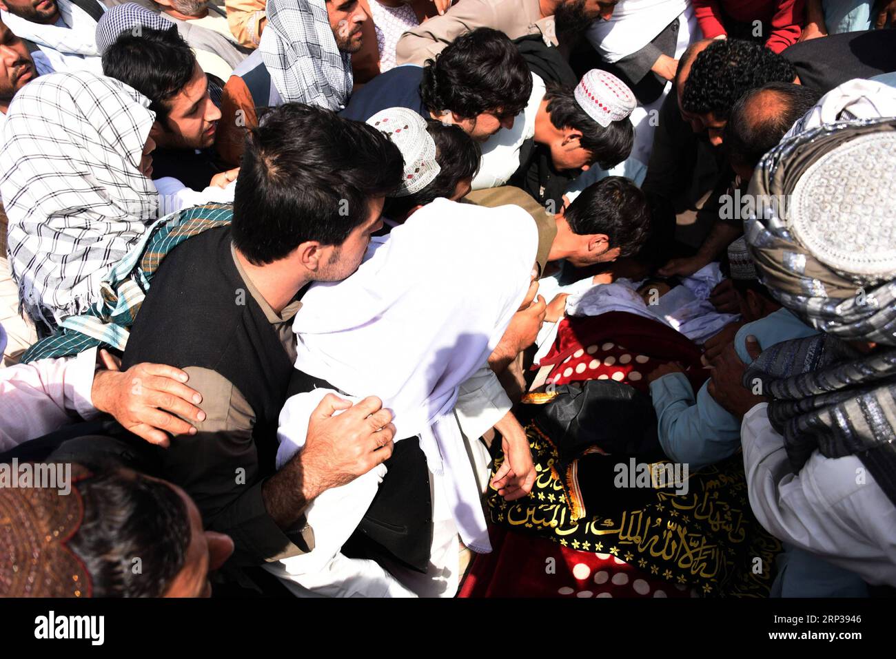 (180926) -- KANDAHAR, Sept. 26, 2018 -- Relatives and friends carry the coffin of Mohammad Nasir Mubaraz, an election candidate for Lower House of parliament election who was killed by gunmen in Kandahar province, Afghanistan, on Sept. 26, 2018. Mohammad Nasir Mubaraz was shot and killed by gunmen in Afghanistan s southern province of Kandahar Tuesday night, a provincial government spokesman said Wednesday. ) (qxy) AFGHANISTAN-KANDAHAR-FUNERAL-ELECTION CANDIDATE SanaullahxSeiam PUBLICATIONxNOTxINxCHN Stock Photo