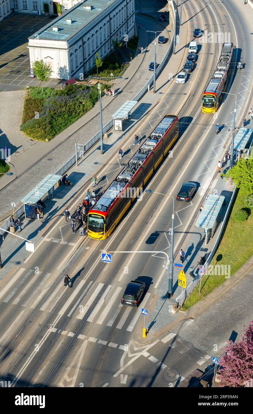 Electric trams driving in the streets of Warsaw Stock Photo