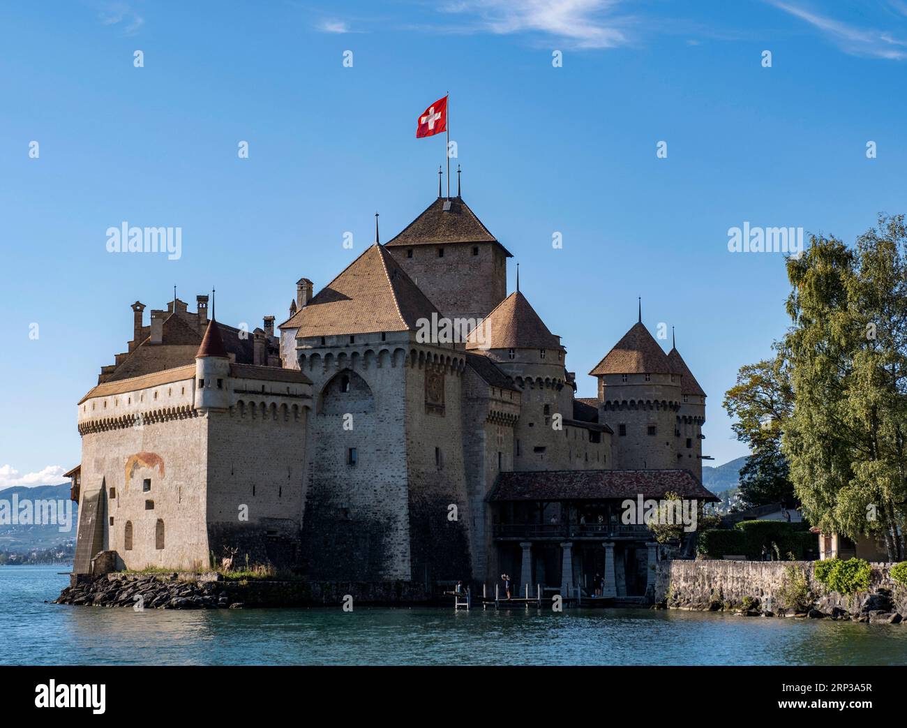 Castle Chillon (Chateau de Chillon) on the shores of Lake Geneva situated between Montreux and Villeneuve in the Canton of Vaud, Switzerland. Stock Photo