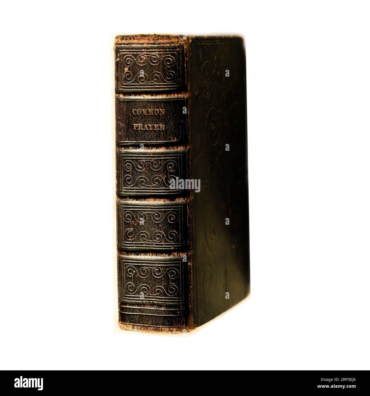 Old leather Book of Common Prayer against white background. Studio set up. Stock Photo