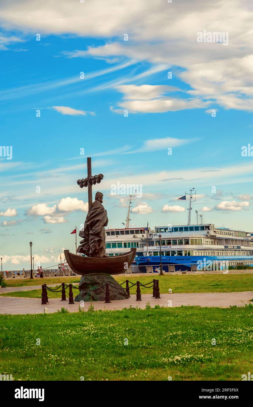 Konevets, Russia, 22 July 2023. Monument to the Monk Arseny of Konevets on Konevets Island overlooking the Monastery of the Nativity of the Theotokos. Stock Photo