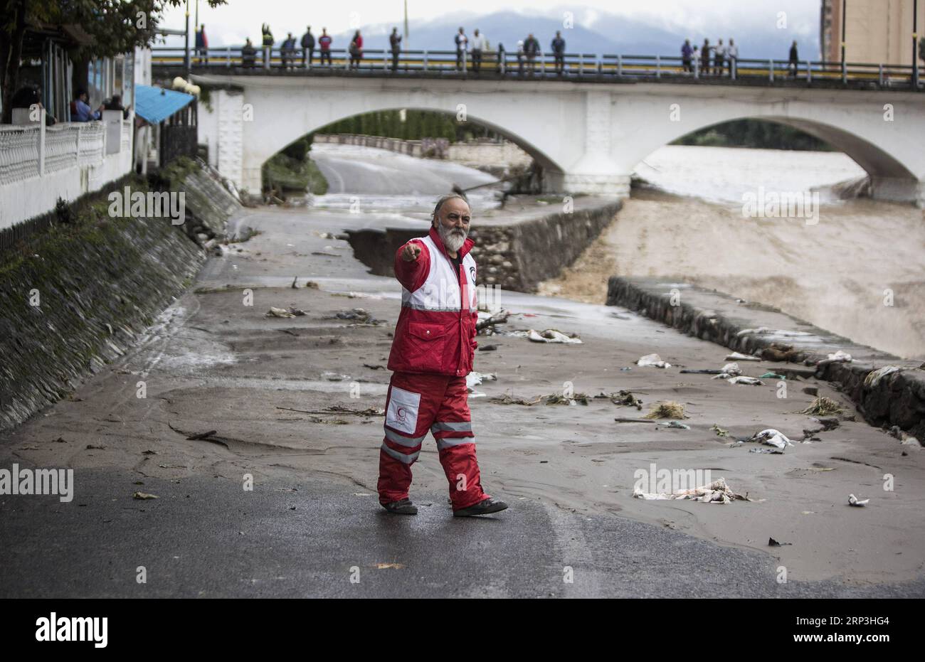 (181007) -- TONEKABON, Oct. 7, 2018 -- A rescuer works beside a flooding river in Tonekabon city, in Mazandaran province, northern Iran, Oct. 6, 2018. Heavy rains in the northern and northwestern parts of Iran over the past two days claimed the lives of at least seven people, semi-official ISNA news agency reported on Saturday. ) (dtf) IRAN-TONEKABON-FLOOD AhmadxHalabisaz PUBLICATIONxNOTxINxCHN Stock Photo