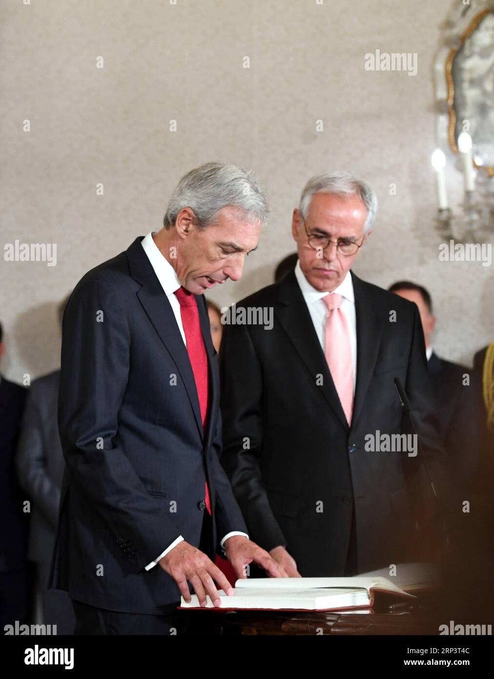 (181015) -- LISBON, Oct. 15, 2018 -- Newly appointed Portuguese Defense Minister Joao Gomes Cravinho (L) attends a swearing-in ceremony of new ministers in Lisbon, Portugal, on Oct. 15, 2018. ) (hy) PORTUGAL-LISBON-CABINET-RESHUFFLE ZhangxLiyun PUBLICATIONxNOTxINxCHN Stock Photo