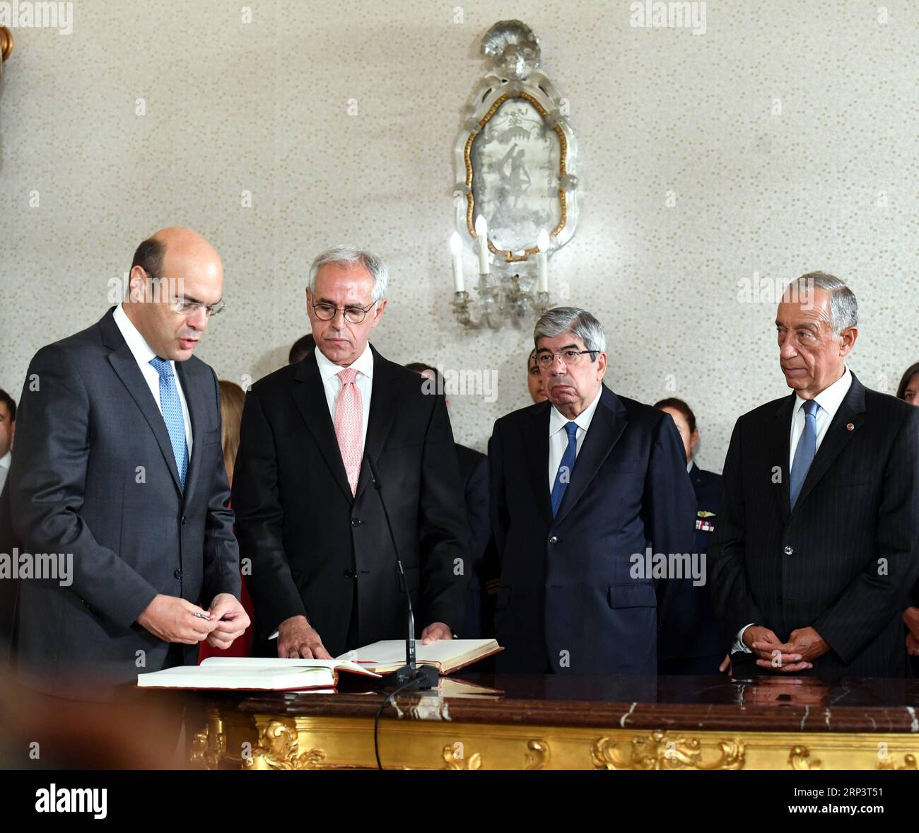 (181015) -- LISBON, Oct. 15, 2018 -- Newly appointed Portuguese Economy Minister Pedro Siza Vieira (1st L) attends a swearing-in ceremony of new ministers in Lisbon, Portugal, on Oct. 15, 2018. ) (hy) PORTUGAL-LISBON-CABINET-RESHUFFLE ZhangxLiyun PUBLICATIONxNOTxINxCHN Stock Photo