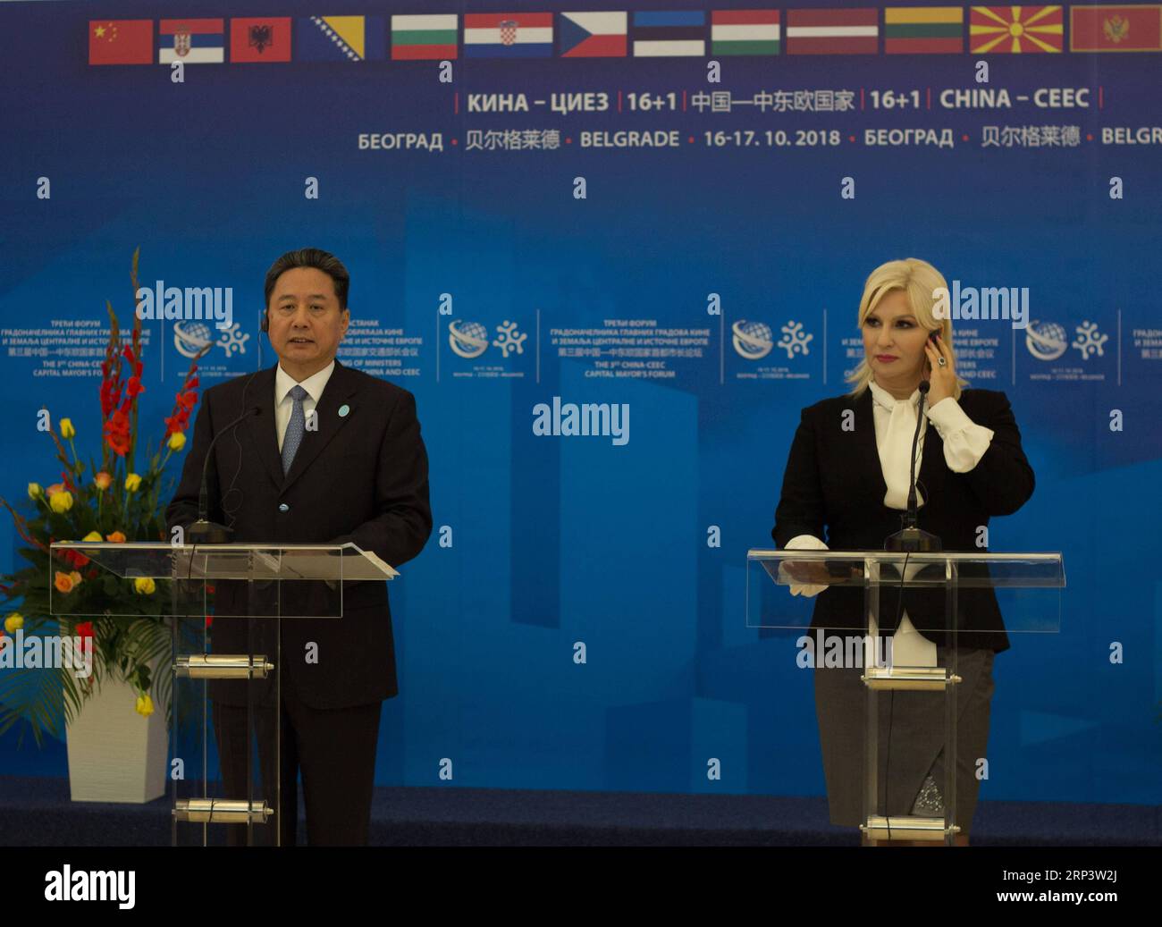 (181016) -- BELGRADE, Oct. 16, 2018 -- Chinese Transport Minister Li Xiaopeng (L) and Serbian Deputy Prime Minister Zorana Mihajlovic attend a joint press conference after the first session of the 3rd China-Central and East European Countries (CEEC) Meeting of Ministers of Transport in Belgrade, Serbia, on Oct. 16, 2018. Transport cooperation between China and Central and East European Countries (CEEC) within the 16+1 mechanism should be strengthened so that interconnection would accompany the trend of increasing trade among these countries, Li Xiaopeng made the suggestion at the 3rd China-CEE Stock Photo