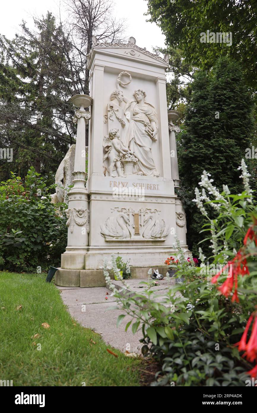 The final resting place of Franz Schubert, situated in Vienna's Central Cemetery, offers a tranquil yet poignant atmosphere. The elegantly carved grav Stock Photo