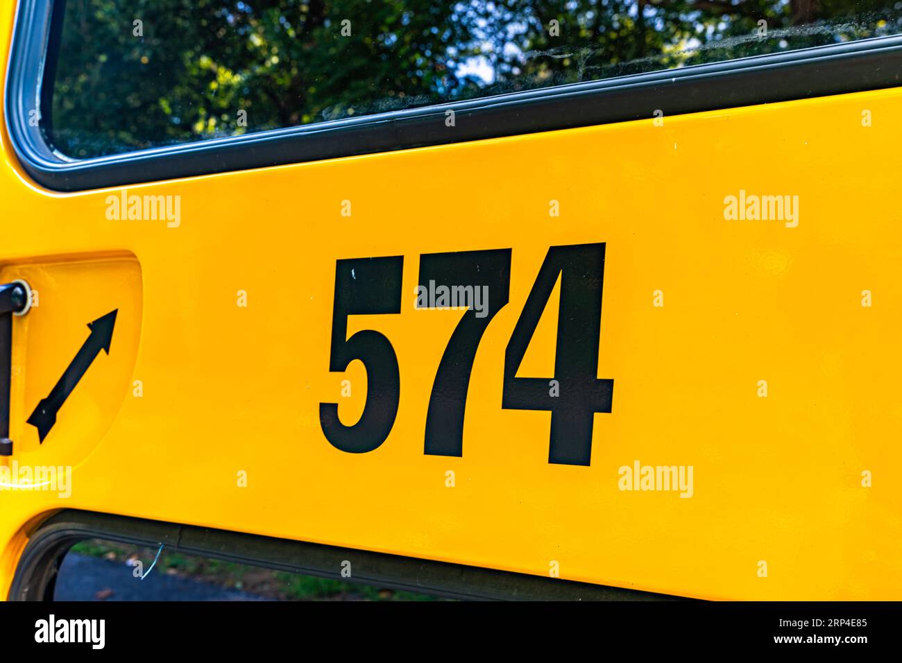 rear of a parked yellow school bus number 674 Stock Photo - Alamy
