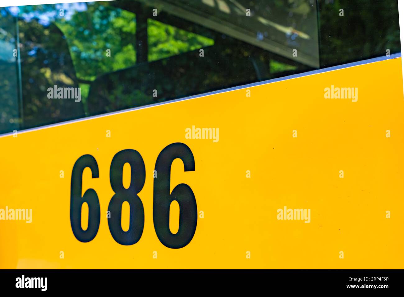 Rear of a parked yellow school bus number 686 Stock Photo Alamy