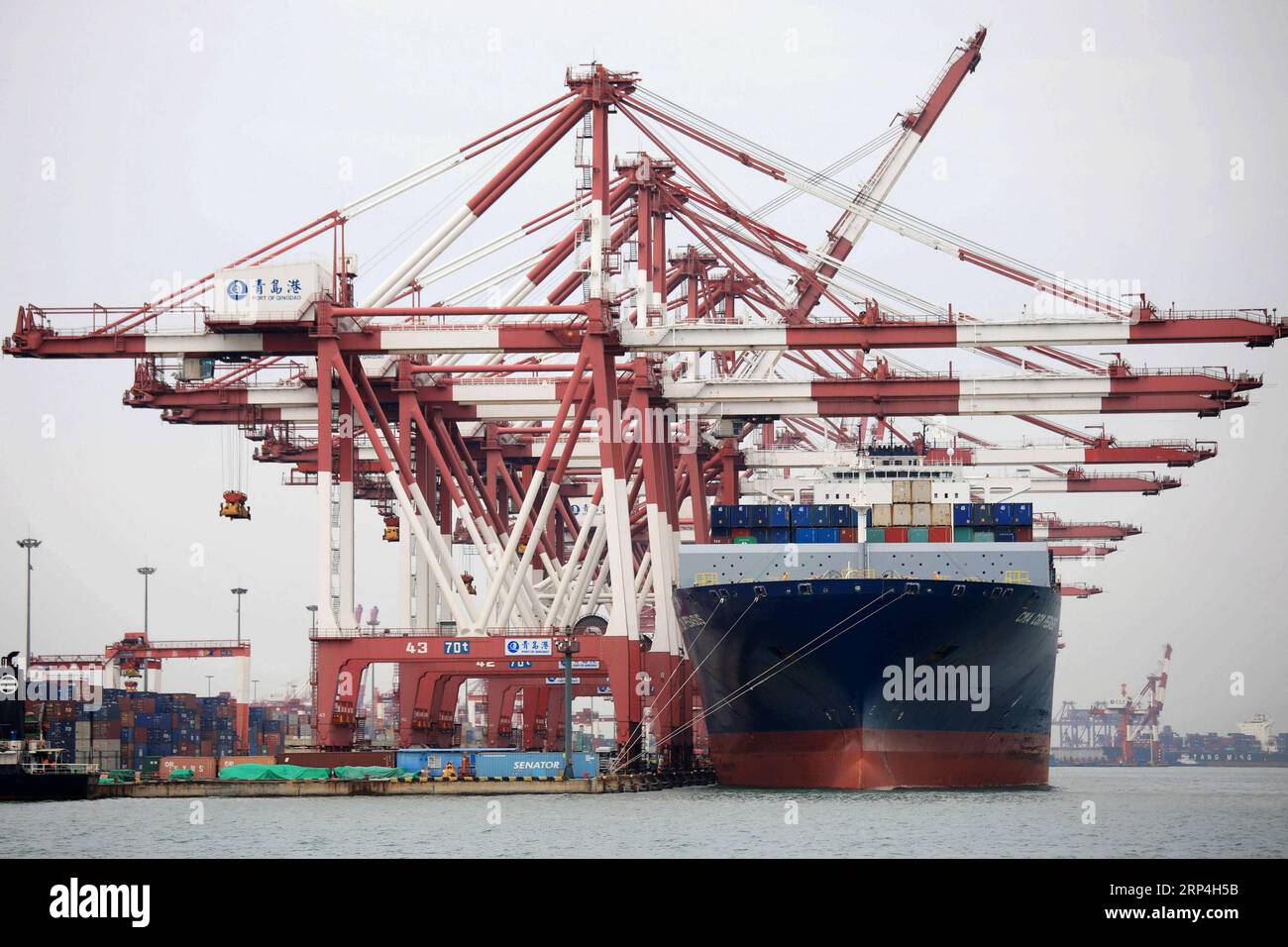 (181108) -- QINGDAO, Nov. 8, 2018 -- A cargo ship unloads containers at the container terminal of Port of Qingdao, east China s Shandong Province, on Nov. 8, 2018. For the first 10 months of 2018, China s foreign trade totaled 25.05 trillion yuan (3.614 trillion U.S. dollars), up 11.3 percent year on year, with export up 7.9 percent, hitting 13.35 trillion yuan (1.926 trillion dollars), and import up 15.5 percent, hitting 11.7 trillion yuan (1.69 trillion dollars) year on year respectively. ) (sxk) CHINA-TRADE-GROWTH (CN) YuxFangping PUBLICATIONxNOTxINxCHN Stock Photo