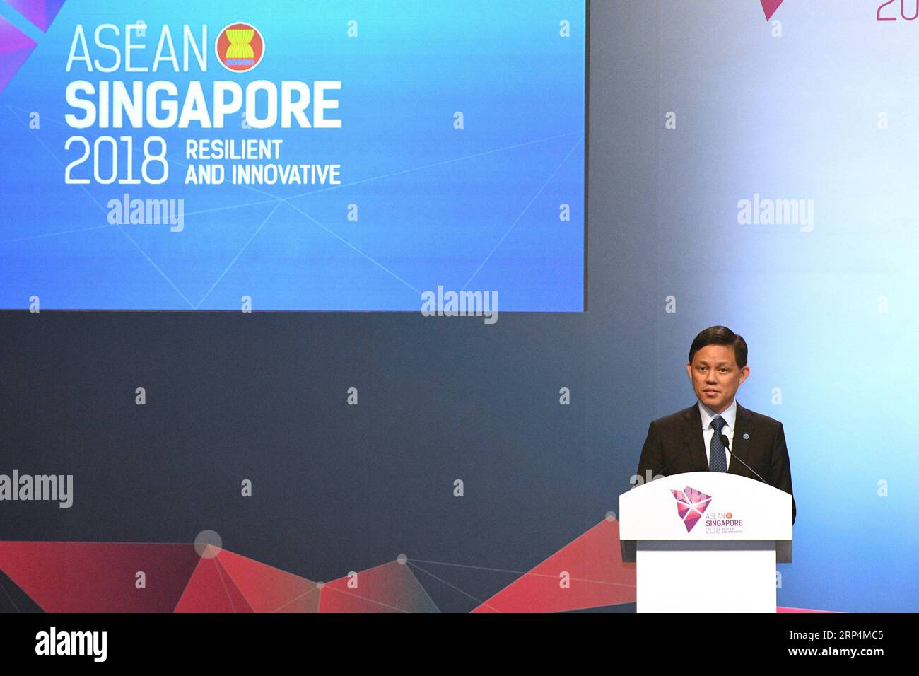 (181112) -- SINGAPORE, Nov. 12, 2018 -- Singaporean Minister for Trade and Industry Chan Chun Sing speaks during the signing ceremony of ASEAN s agreement on e-commerce, in Singapore, on Nov. 12, 2018. Trade ministers of the Association of Southeast Asian Nations (ASEAN) member states signed an agreement on e-commerce on Monday, encouraging paperless trading between businesses and governments of the bloc to generate rapid and efficient transactions. ) (nxl) SINGAPORE-ASEAN-E-COMMERCE-AGREEMENT ThenxChihxWey PUBLICATIONxNOTxINxCHN Stock Photo