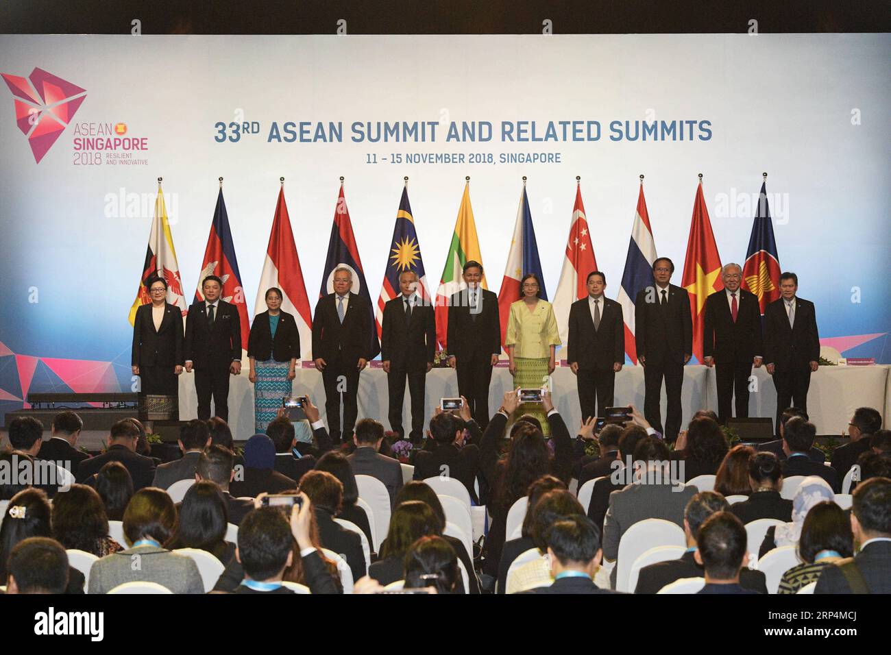 (181112) -- SINGAPORE, Nov. 12, 2018 -- Representatives attend the signing ceremony of ASEAN s agreement on e-commerce, in Singapore, on Nov. 12, 2018. Trade ministers of the Association of Southeast Asian Nations (ASEAN) member states signed an agreement on e-commerce on Monday, encouraging paperless trading between businesses and governments of the bloc to generate rapid and efficient transactions. ) (nxl) SINGAPORE-ASEAN-E-COMMERCE-AGREEMENT ThenxChihxWey PUBLICATIONxNOTxINxCHN Stock Photo