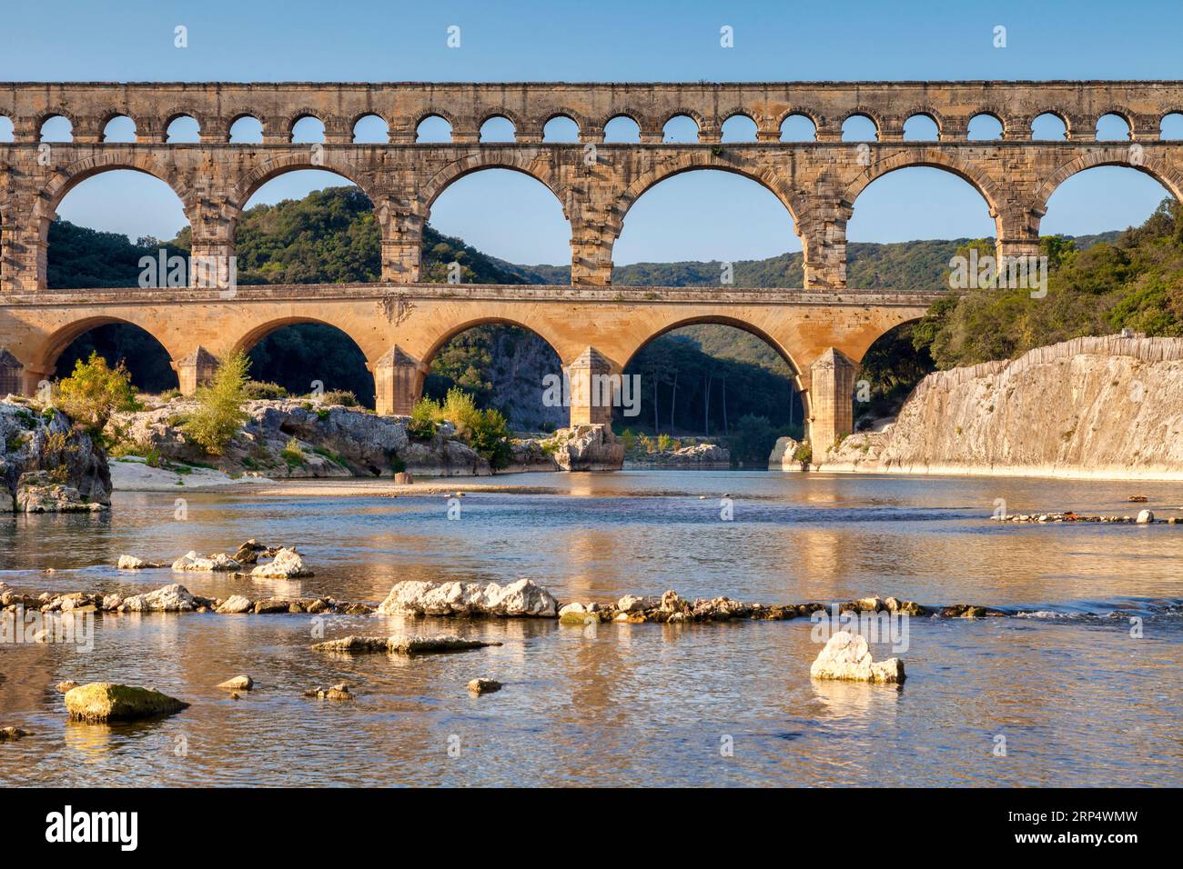 Pont du Gard Roman Aqueduct, Languedoc-Roussillon, France, in early autumn. This was built by the Romans in the first century AD to carry water from... Stock Photo