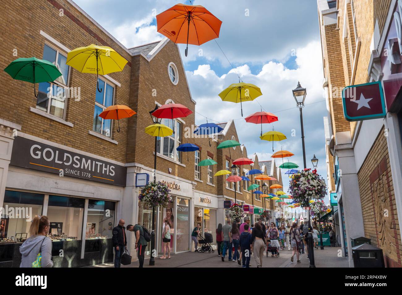 Umbrellas art installation on Norris Road in Staines-upon-Thames town centre, Surrey, England, UK Stock Photo