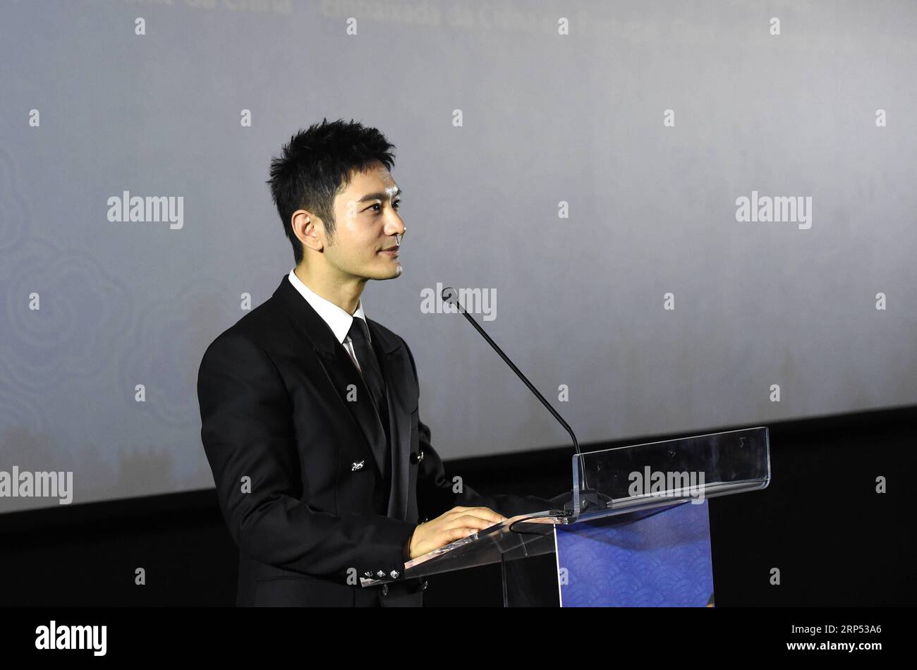 (181125) -- LISBON, Nov. 25, 2018 -- Huang Xiaoming, actor of the film American Dreams in China, speaks at the opening ceremony of Chinese Film Week in Lisbon, Portugal, on Nov. 25, 2018. Chinese Film Week kicked off in Lisbon on Sunday with seven Chinese films on show in cinemas across the country. ) PORTUGAL-LISBON-CHINESE FILM WEEK-OPENING ZhangxLiyun PUBLICATIONxNOTxINxCHN Stock Photo