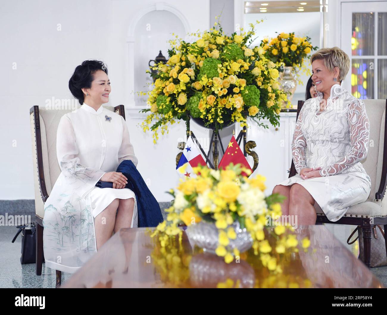 (181203) -- PANAMA CITY, Dec. 3, 2018 -- Peng Liyuan (L), wife of Chinese President Xi Jinping, and World Health Organization goodwill ambassador for tuberculosis and HIV/AIDS and UNESCO special envoy for the advancement of girls and women s education, meets with Panamanian First Lady Lorena Castillo Garcia, a special ambassador for UNAIDS in Latin America, in Panama City, Panama, Dec. 3, 2018. Peng and Castillo jointly attended a publicizing activity on AIDS prevention and treatment on Monday. ) (zwx) PANAMA-CHINA-PRESIDENTS WIVES-AIDS PREVENTION YanxYan PUBLICATIONxNOTxINxCHN Stock Photo