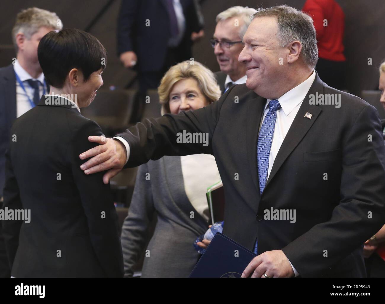 (181204) -- BRUSSELS, Dec. 4, 2018 -- U.S. Secretary of State Mike Pompeo (R) greets Norwegian Foreign Minister Ine Marie Eriksen Soreide during a session of the NATO foreign ministers meeting with their Georgian and Ukrainian counterparts in Brussels, Belgium, Dec. 4, 2018. ) (lmm) BELGIUM-BRUSSELS-NATO-FM-MEETING YexPingfan PUBLICATIONxNOTxINxCHN Stock Photo