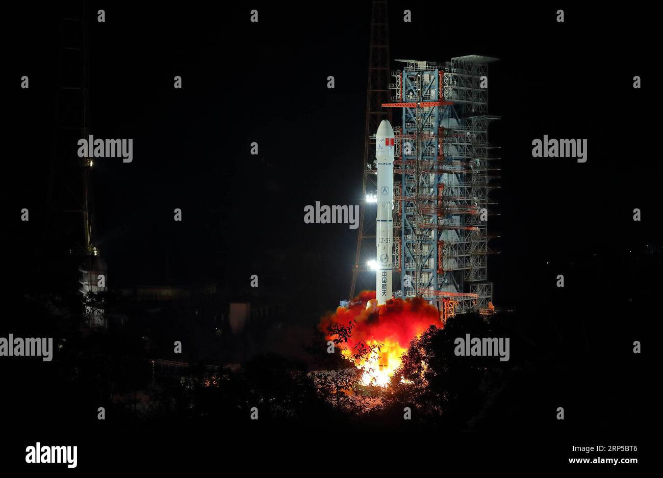 (181208) -- XICHANG, Dec. 8, 2018 -- China launches Chang e-4 lunar probe in the Xichang Satellite Launch Center in southwest China s Sichuan Province, Dec. 8, 2018. The probe is expected to make the first-ever soft landing on the far side of the moon. A Long March-3B rocket, carrying the probe including a lander and a rover, blasted off from Xichang at 2:23 a.m., opening a new chapter in lunar exploration. The scientific tasks of the Chang e-4 mission include low-frequency radio astronomical observation, surveying the terrain and landforms, detecting the mineral composition and shallow lunar Stock Photo